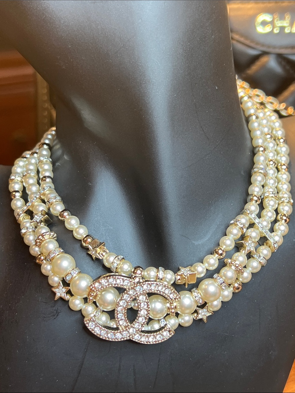 Inspired Pearl Triple Strand Necklace with Crystal Logo